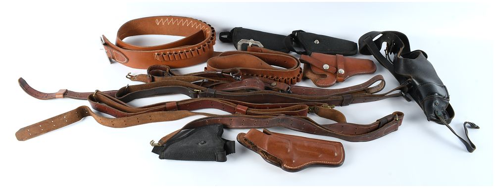 Lot 1403: A Collection of Vintage and Modern Firearm Accessories Including Five Holsters and Multiple Leather Cartridge Belts and Straps