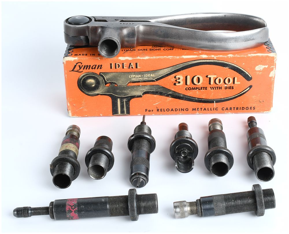 Lot 1457: Lyman Ideal 310 Hand-Operated Reloading Tool with Eight Die Components and Original Box