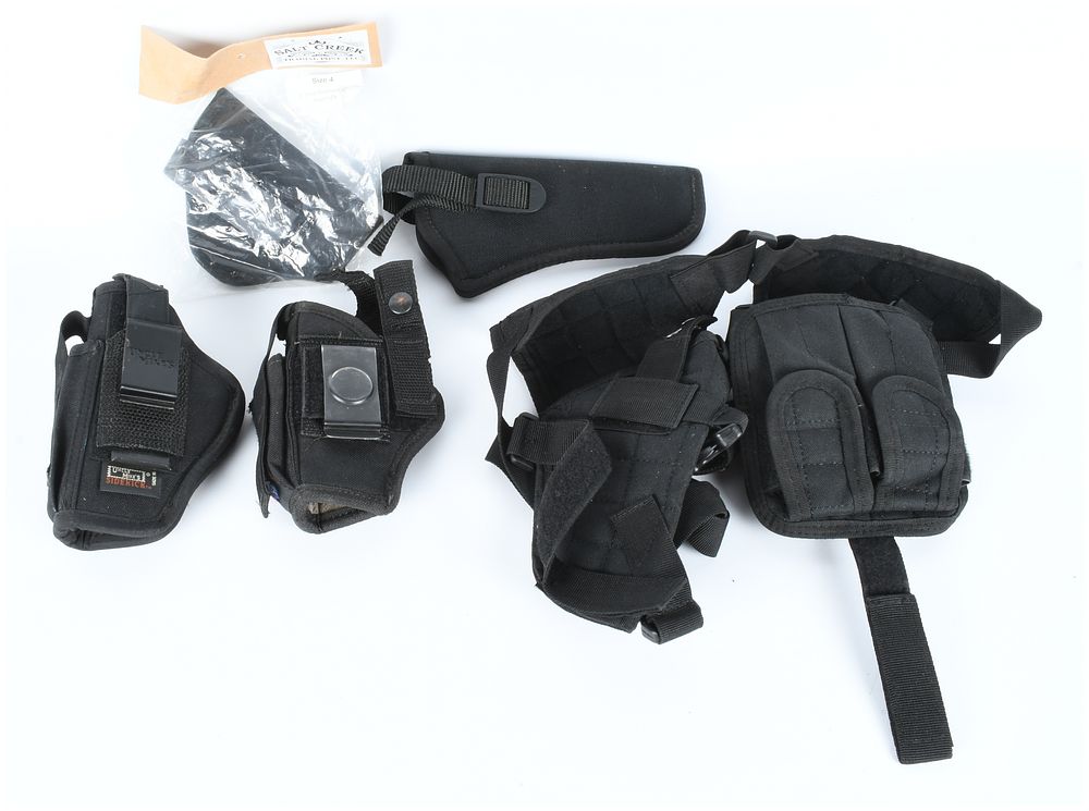 Lot 1496: A Collection of 5 Black Synthetic Nylon Holsters and Carry Gear, including Shoulder Rig