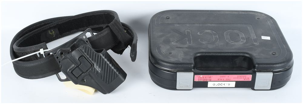Lot 1532: Collection of Glock 19 Pistol Accessories including Factory Case Holster and Muzzle Compensator