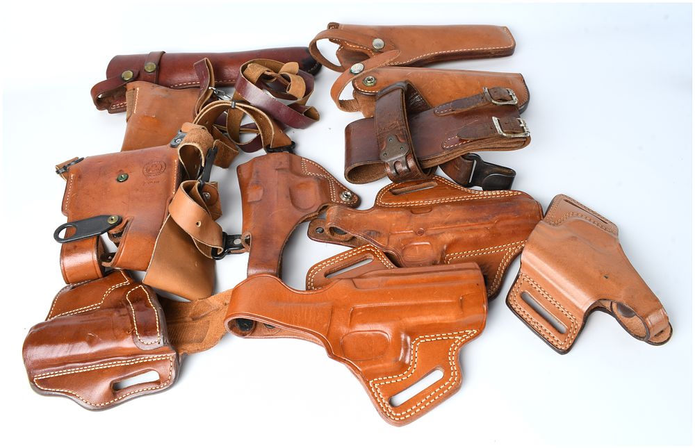 Lot 137: Extensive Collection of Vintage Leather Firearm Holsters and Duty Rigging Components, Circa 1970s