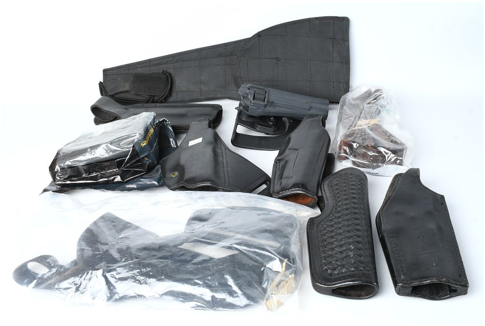 Lot 287: Mixed Lot of Ten Tactical and Duty Holsters and Gear Components, Late 20th to Early 21st Century