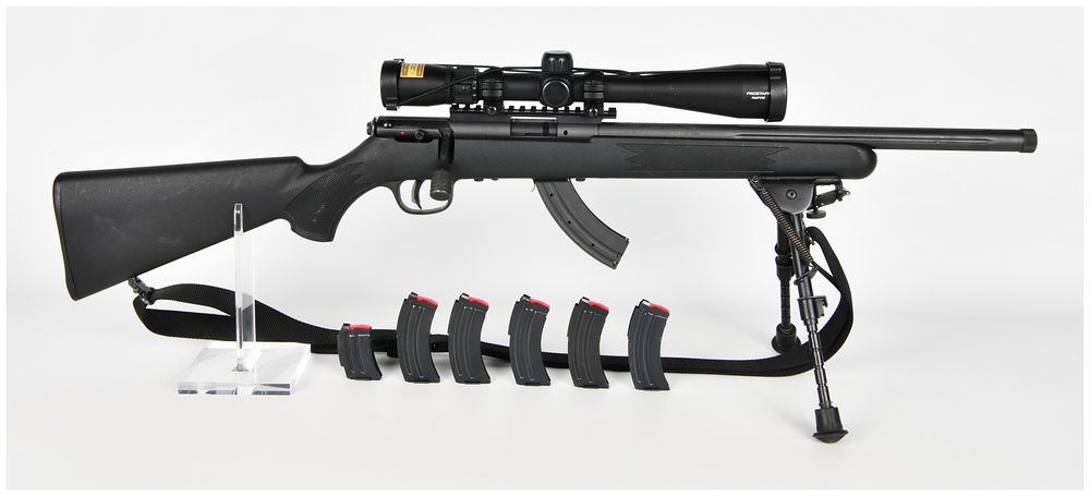 Lot 411: Savage Mark II Bolt-Action .22 LR Rifle with Nikon Scope and Seven Magazines