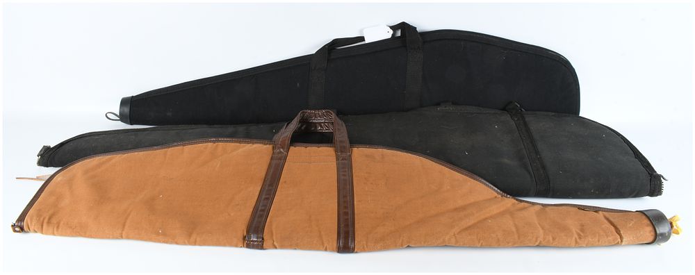 Lot 511: Three Soft Rifle Hunting Cases including Bucheimer