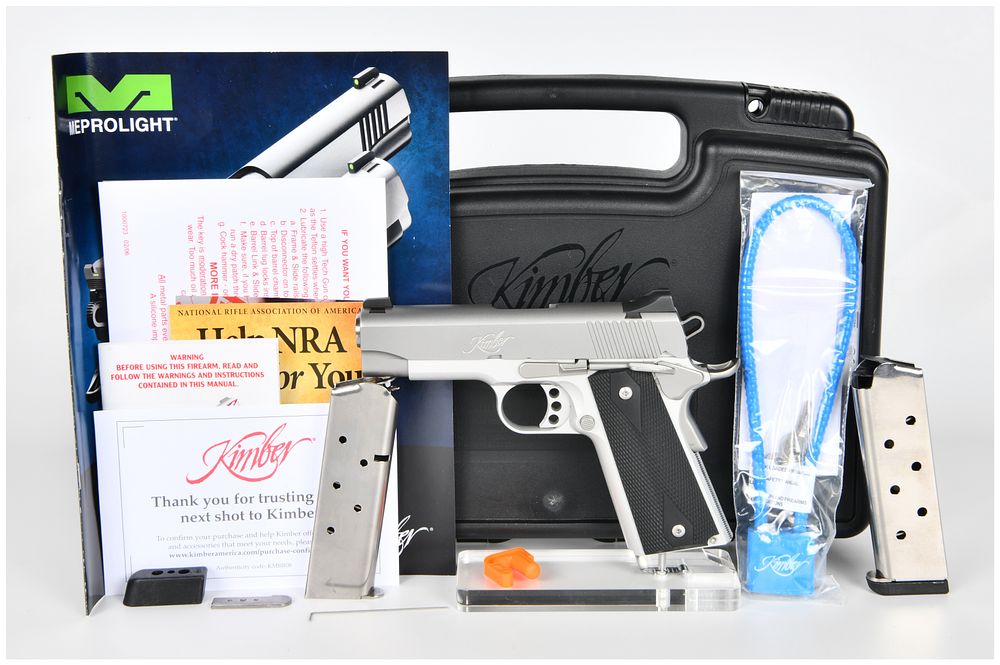 Lot 1059: Kimber Stainless Pro Carry II .45 ACP Semi-Automatic Pistol with Original Case and Two Magazines, c. 2000s