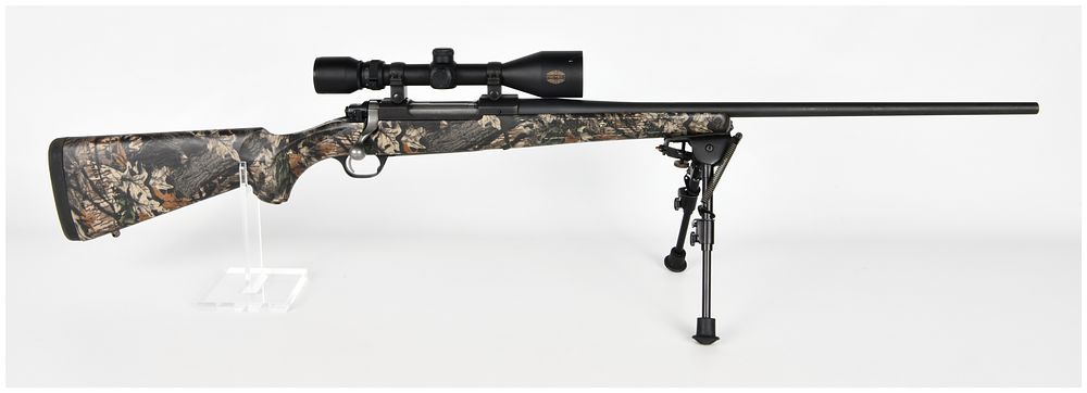Lot 1062: Ruger M77 Mark II Bolt Action Rifle 7mm Rem Mag with Camo Stock and Simmons Scope 1990s