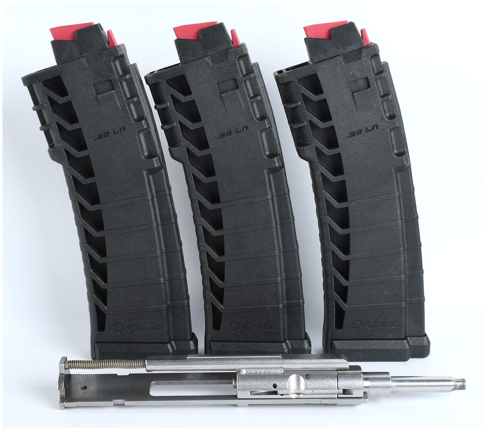Lot 1121: CMMG AR-15 .22 LR Conversion Kit with Stainless Steel Bolt Group and Three Magazines, c. 2015-2023