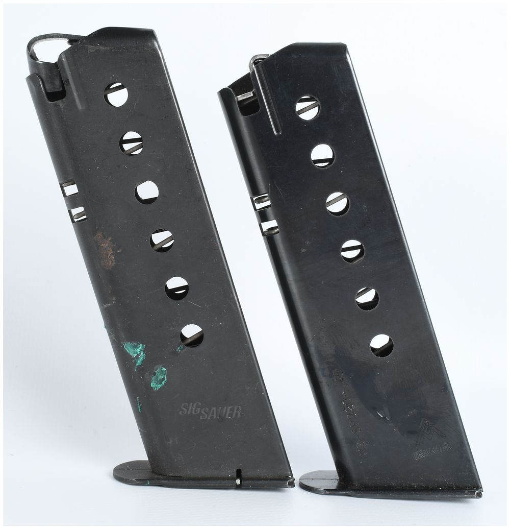 Lot 1174: Two Sig Sauer P220 .45 ACP Handgun Magazines