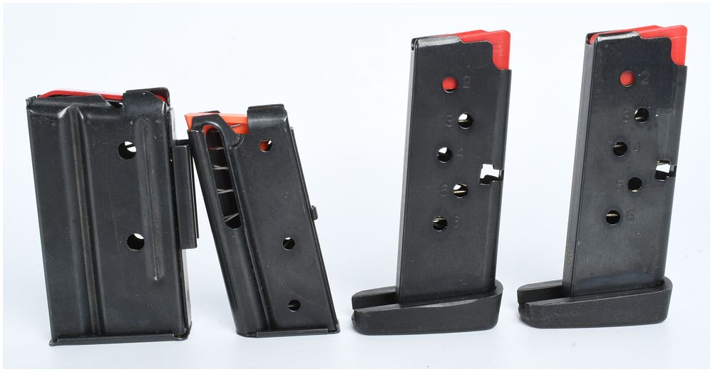 Lot 1352: A Group of 4 Taurus PT 738 and Assorted Firearm Magazines