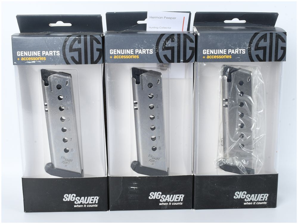 Lot 1439: Three Sig Sauer P220 .45 ACP 8-Round Magazines