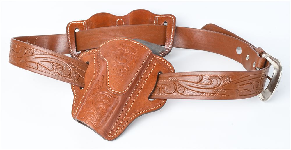 Lot 56: A Trio of Floral-Tooled Leather Holster Rig Components Including a 40" to 44" Size Belt