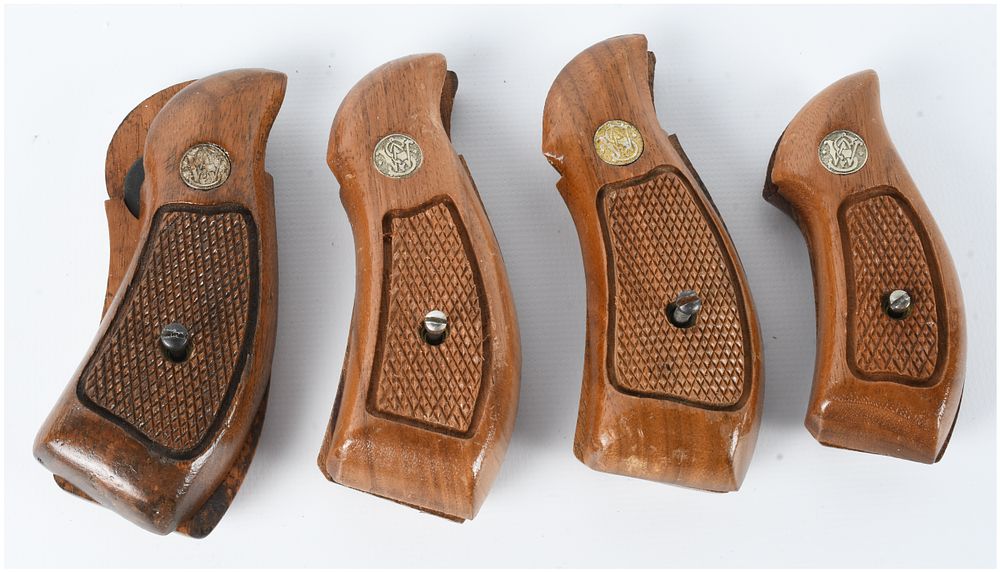 Lot 230: 4 Sets of Smith & Wesson Checkered Walnut Revolver Grips