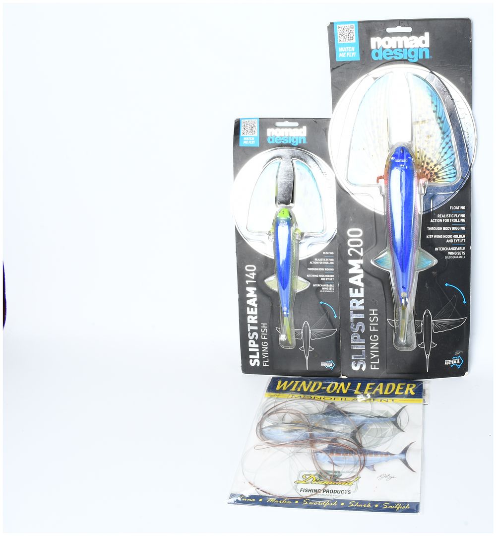 Lot 287: A Trio of Nomad Design Slipstream Flying Fish Lures and Diamond Fishing Products Leader