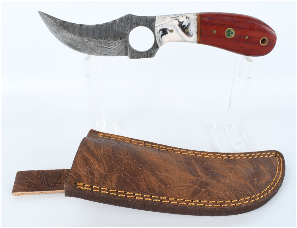 Lot 302: Damascus Steel Trailing Point Skinner Knife with Two-Tone Composite Handle and Leather Sheath