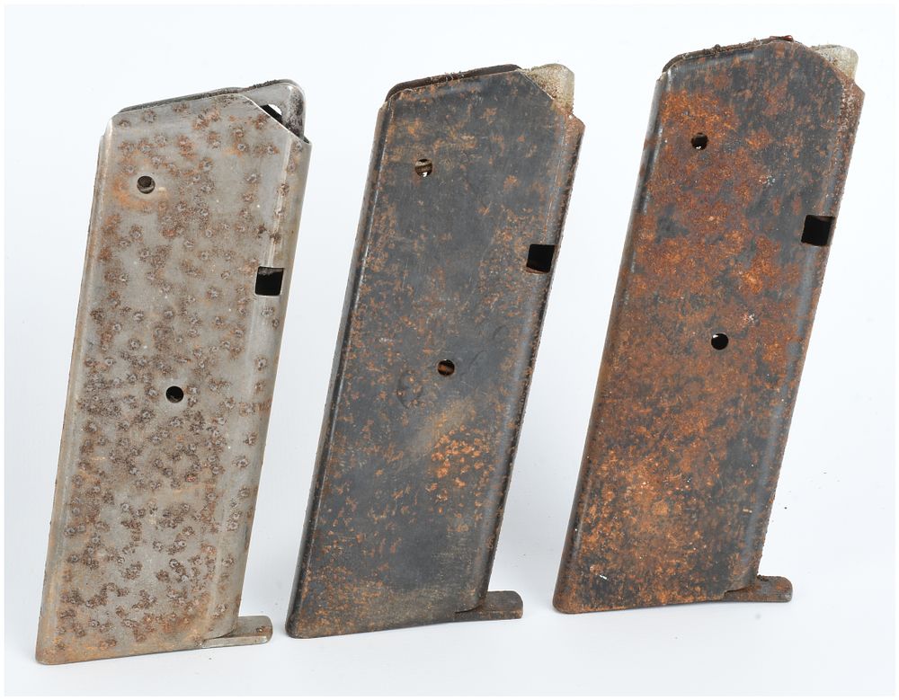 Lot 382: Three UNIDENTIFIED .22 Caliber Pistol Magazines