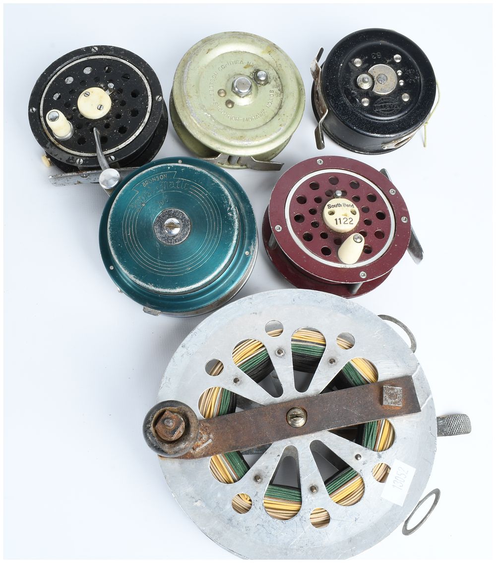 Lot 443: A Collection of Vintage Fly and Wire Line Fishing Reels including Bronson, South Bend, and Martin