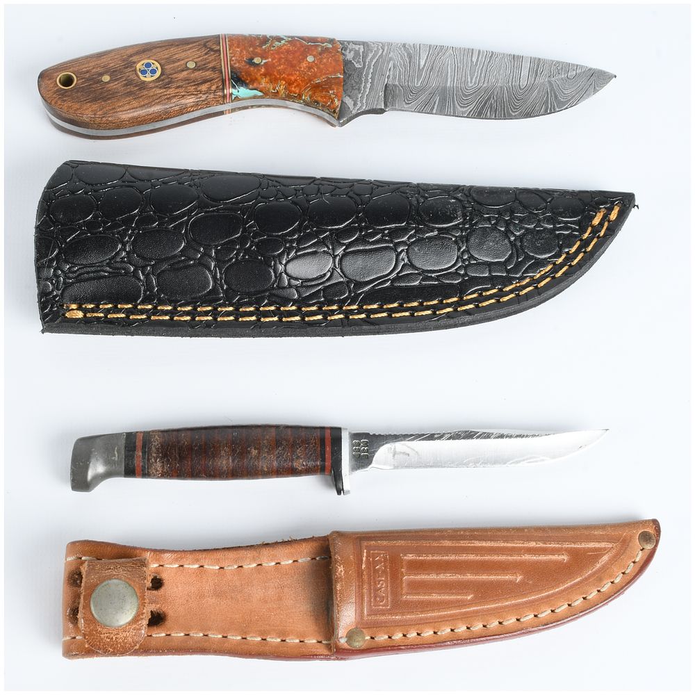 Lot 554: A Pair of Fixed Blade Hunting Knives Including a Case XX M3F SSP and a Custom Damascus Steel Knife