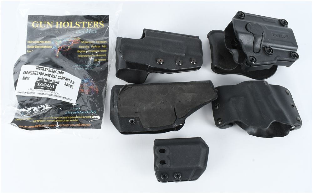 Lot 584: A Collection of Six Polymer and Kydex Holsters and Accessories