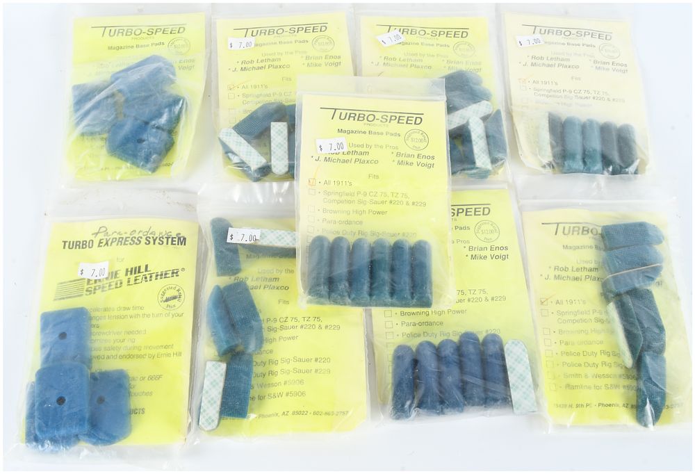 Lot 1118: A Collection of Turbo-Speed Products Magazine Base Pads and Holster Accessories