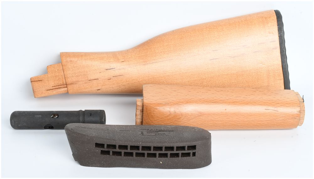Lot 1238: A Collection of 4 Firearm Accessories Including AK-Type Wood Furniture and Uncle Mike's Recoil Pad