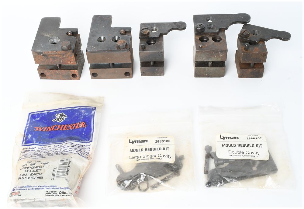 Lot 1324: A Collection of 8 Bullet Molds and Reloading Components including RCBS, Lyman, and Winchester