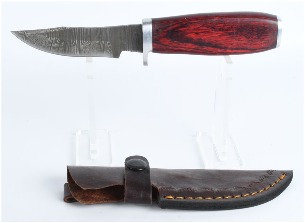 Lot 1511: Damascus Steel Clip Point Hunting Knife with Laminated Wood Handle