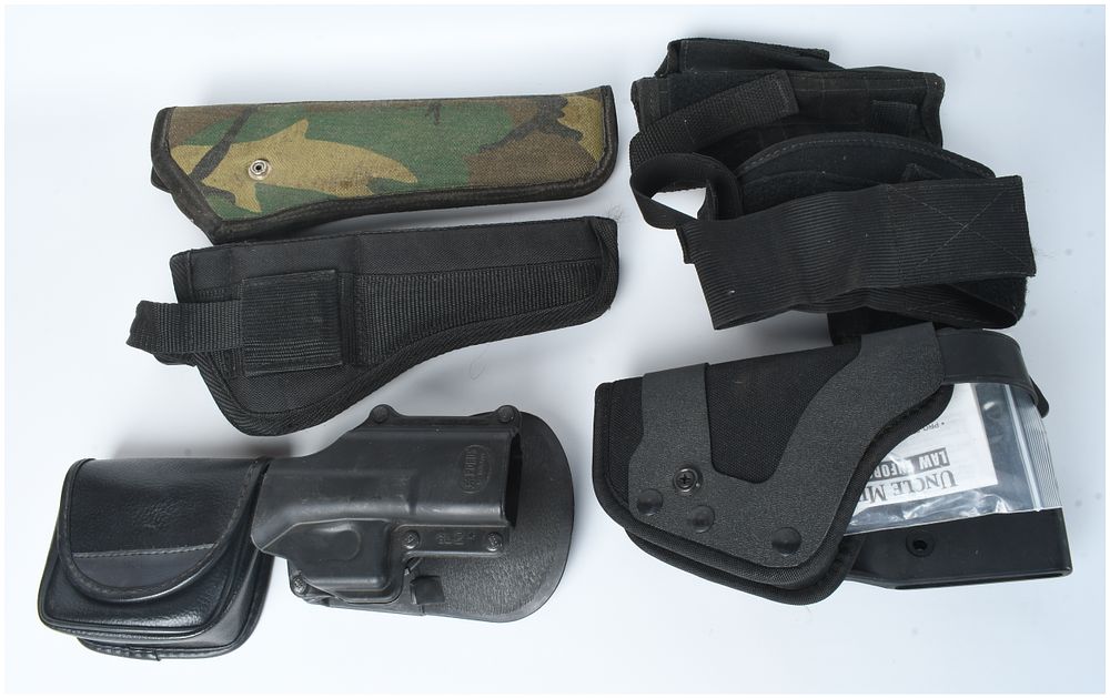 Lot 1550: A Collection of Fobus, Uncle Mike's, and Assorted Firearm Holsters and Accessories