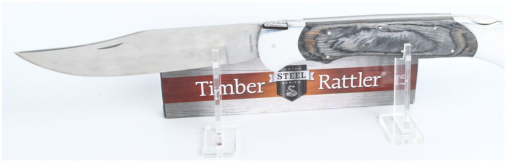 Lot 1553: Timber Rattler Giant Folding Lockback Knife with Display Stand
