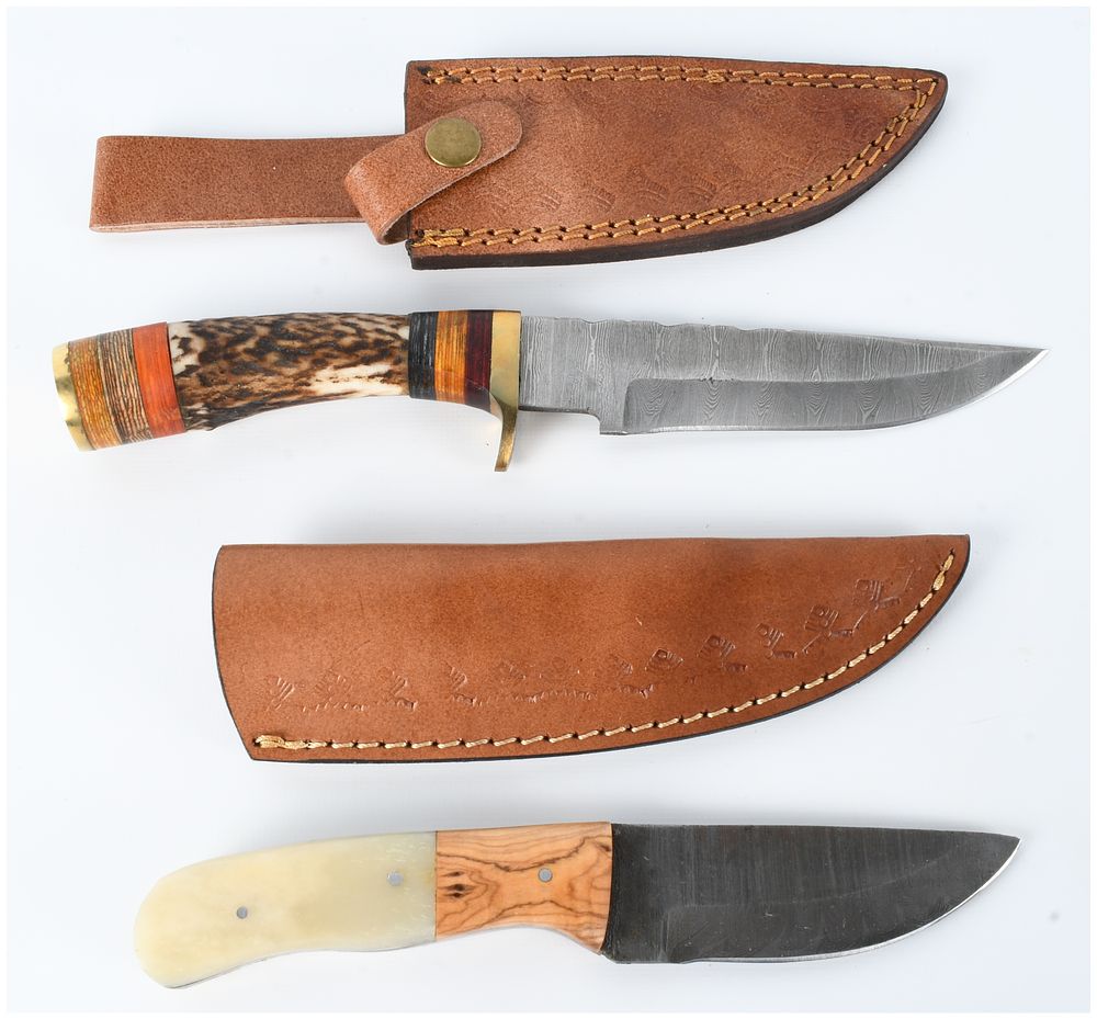 Lot 1561: Two Custom Style Damascus Steel Fixed Blade Hunting Knives with Leather Sheaths