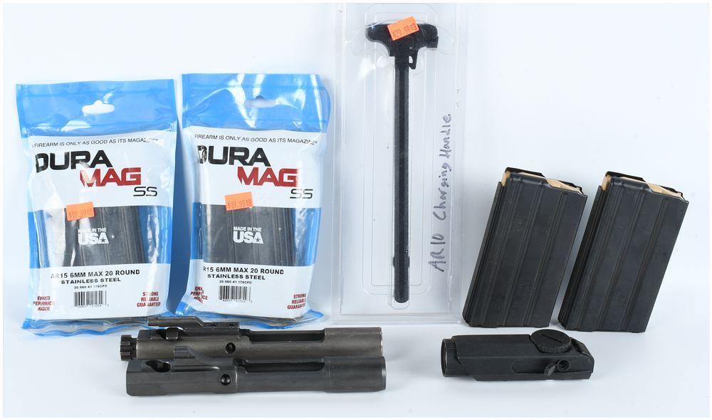Lot 1574: A Lot of 8 Firearm Components and Accessories Including 6mm Magazines and Bolt Carrier Groups