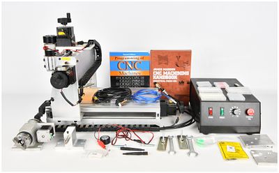 Desktop 4-Axis Mini CNC Router Engraver Model CNCST2030AT4 with Control Box and Accessories. This 
