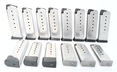 A Lot of 14 Kahr Arms Semi-Automatic Pistol Magazines in .45 ACP, 9mm, .40 S&W, and .380 ACP. Thi 