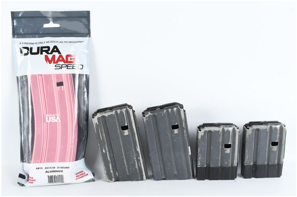 Lot 269: A Lot of 5 Colt and Duramag AR-15 Rifle Magazines 5.56x45mm