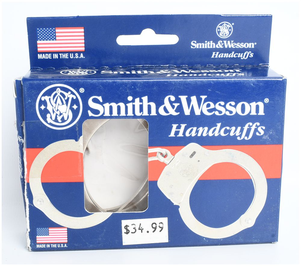 Lot 278: Smith & Wesson Model 100P-1 Nickel-Plated Handcuffs