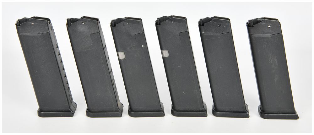 Lot 467: A Collection of Six Glock .40 S&W Semi-Automatic Pistol Magazines
