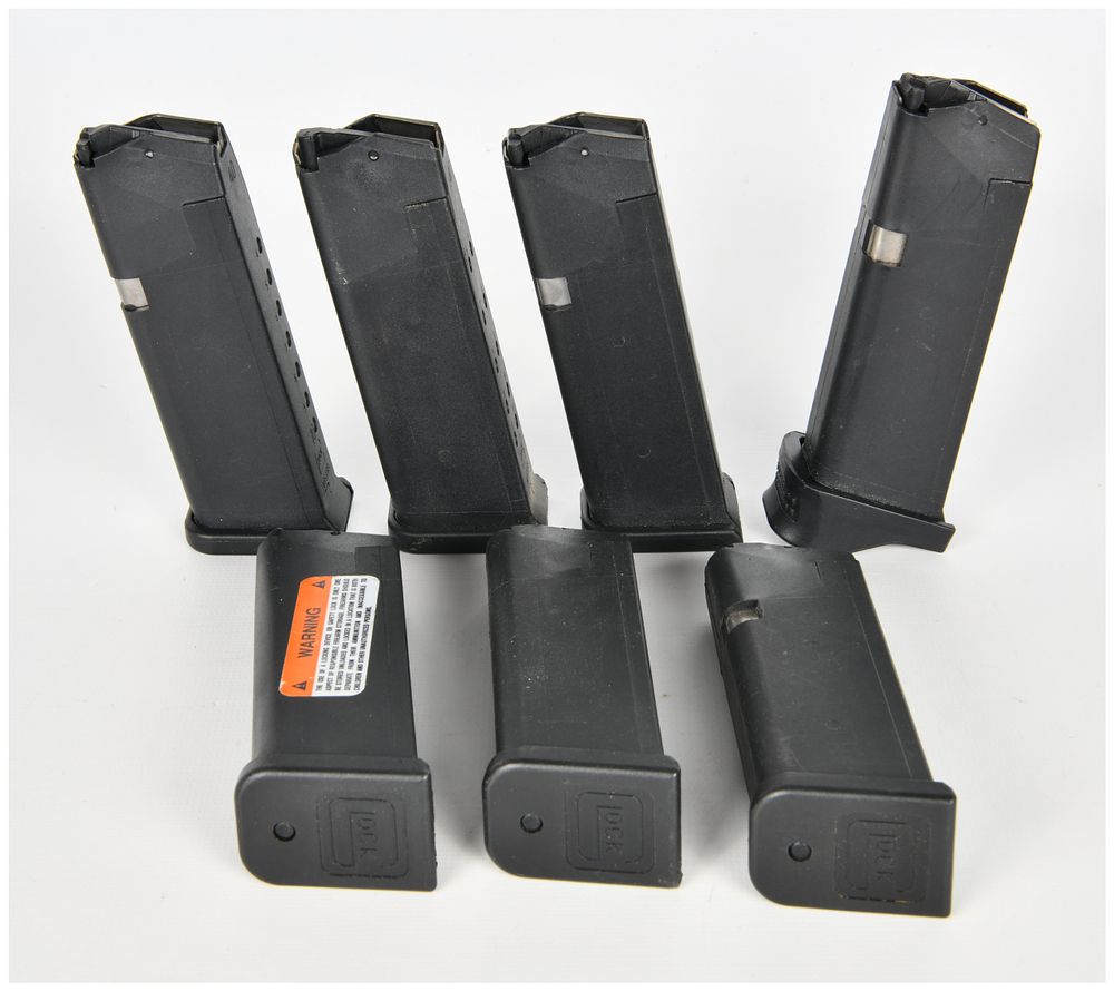 Lot 497: A Collection of 7 Glock Factory OEM Semi-Automatic Pistol Magazines .40 S&W