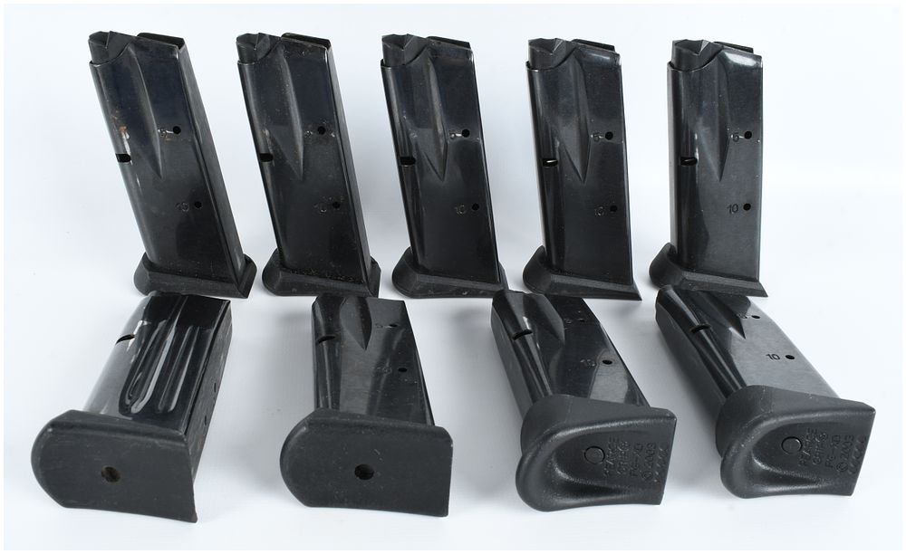 Lot 554: A Lot of 9 Springfield Armory XD and Taurus Millennium Semi-Automatic Pistol Magazines 9mm and .40 S&W