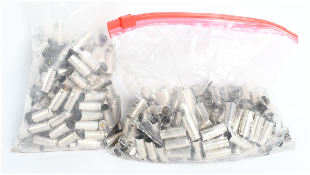 Lot 569: A Lot of 350 Remington and Winchester Nickel-Plated .38 Super and .38 Auto Spent Casings
