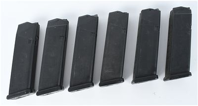 A Lot of Six Glock Semi-Automatic Pistol Magazines. This lot consists of six factory 