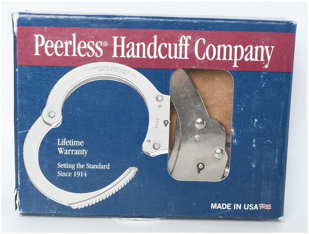Lot 1058: A Pair of Peerless Handcuff Company Model 702C-6X Nickel-Plated Chain Link Handcuffs