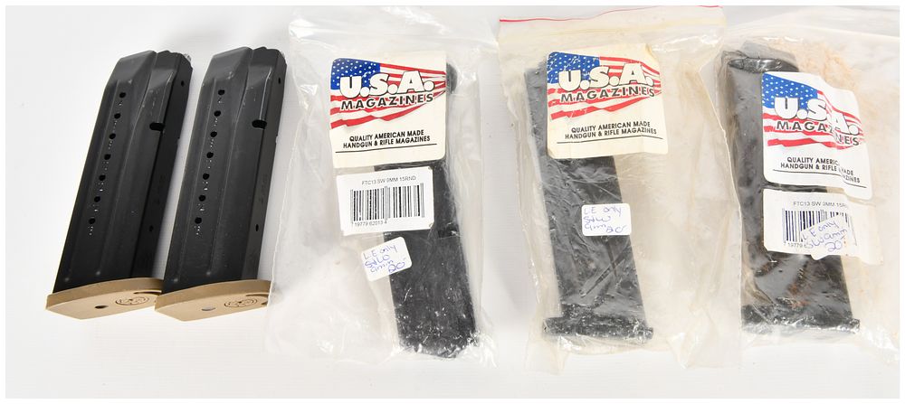Lot 1097: A Lot of 5 Smith and Wesson and Aftermarket 9mm Handgun Magazines