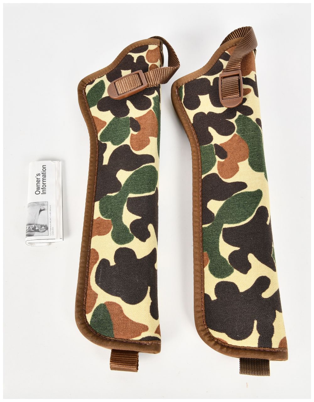 Lot 1112: A Pair of Uncle Mike's Sidekick Camouflage Holsters Size 17
