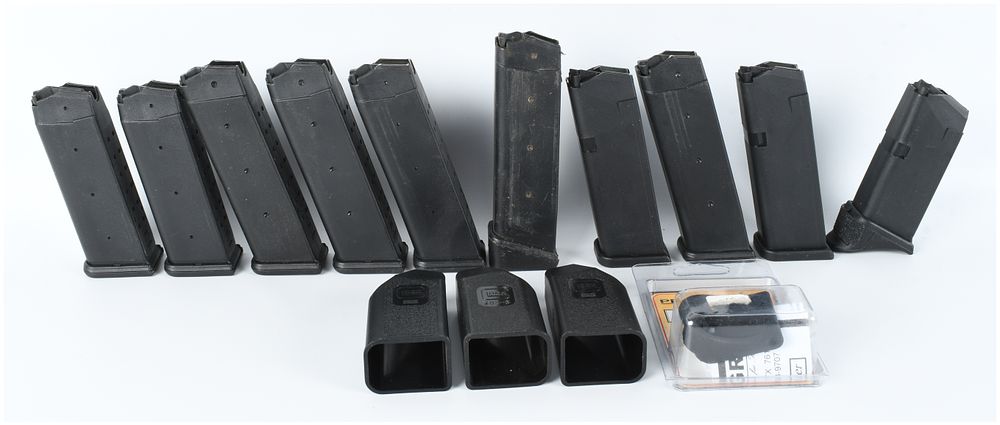 Lot 1343: A Collection of 10 Glock Semi-Automatic Pistol Magazines and Accessories .40 S&W