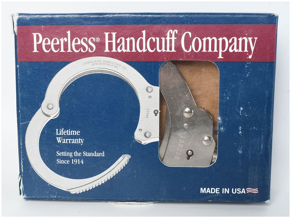 Lot 1385: A Pair of Peerless Handcuff Company Nickel Plated Chain Handcuffs with Original Box