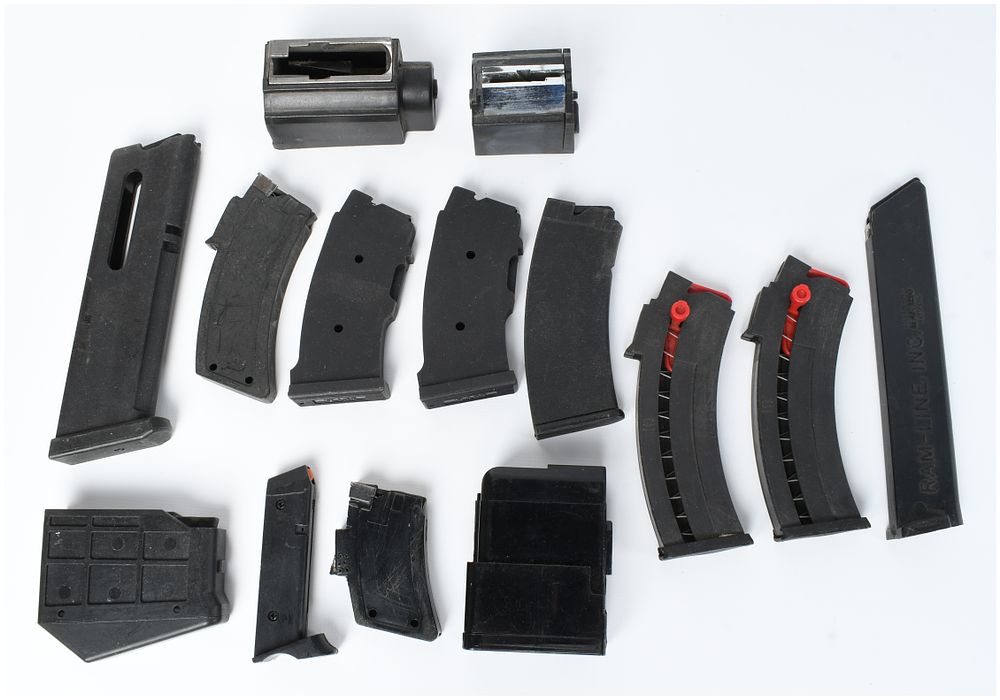 Lot 1433: A Collection of 14 Assorted Firearm Magazines and Components Primarily .22 LR