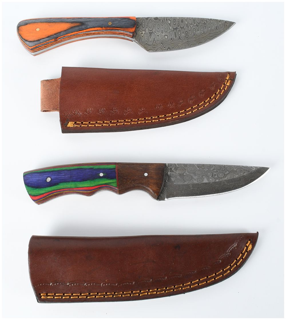 Lot 1508: A Pair of Contemporary Damascus Steel Fixed-Blade Knives with Leather Sheaths