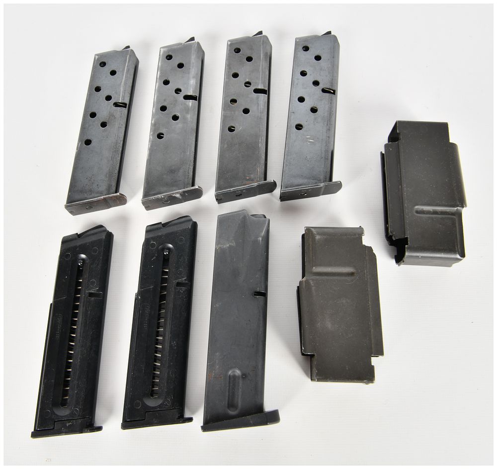Lot 1517: A Collection of 9 Assorted Pistol and Rifle Magazines Including Smith & Wesson and Browning