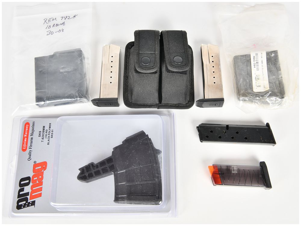Lot 1547: A Collection of 7 Miscellaneous Firearm Magazines and Double Magazine Pouch