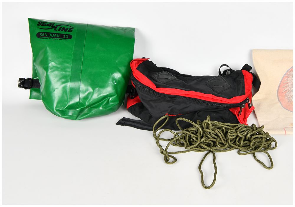 Lot 1598: An Assortment of Outdoor Gear Featuring SealLine and Seal Gear Dry Bags and a Camp Trails Waist Pack