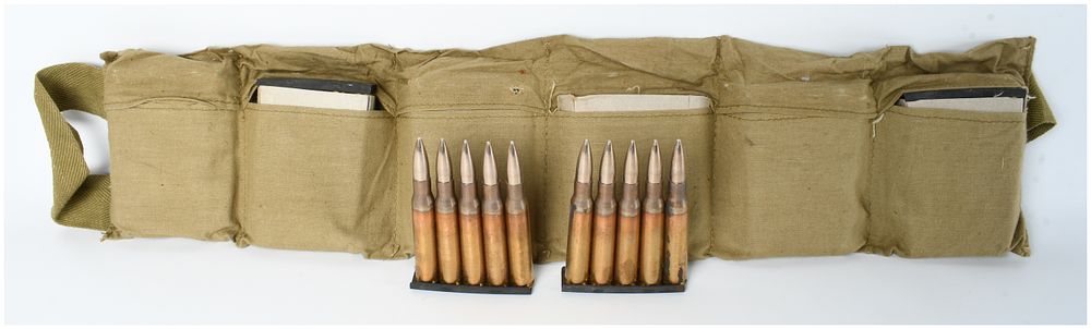 Lot 139: A Lot of 60 Rounds of .30-06 Springfield Ammunition on Stripper Clips with Bandolier